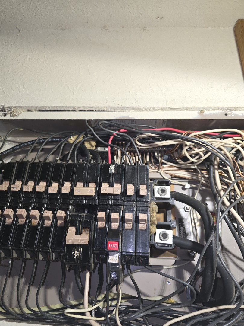 eletricion needed 
crazy wiring breakers sparking cant get lights or fans to work lets go we got ya