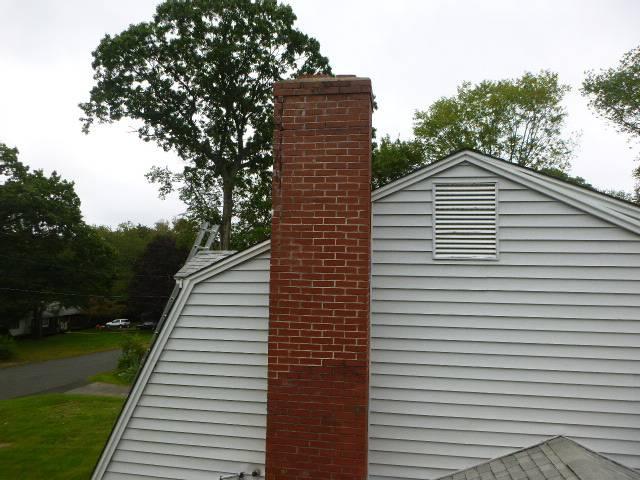 Chimney was coming apart at top and had deterioration of an interior tile.  Rebuilt from lower roofline up  and relined the  heating system chimney.   Chimney was coming apart at top and had deterioration of an interior tile.  Rebuilt from lower roofline up  and relined the  heating system chimney.