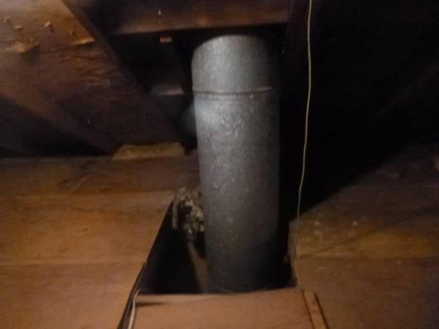 Replaced improper singe wall galvanized pipe, with no clearance to combustibles ,  with a proper stainless steel insulated Class A chimney system