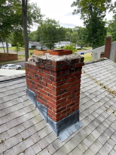 Completely rebuilt east hartford chimney with new flashing , new chimney liner to vent heating appliance and installed a stainless steel chimney cap