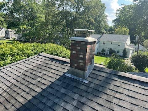 Complete chimney rebuild in Fairfied County Ct from the roof up including new lead flashing  Complete chimney rebuild in Fairfied County Ct from the roof up including new lead flashing