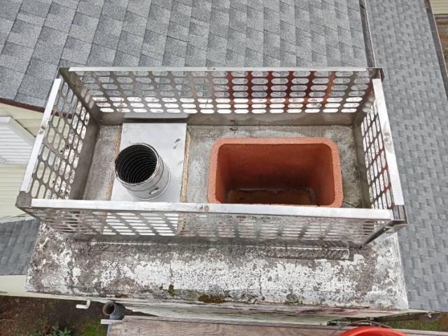 Furnace was removed so chimney only vented the small 3 in water heater.  9x13 tile liner was too large to vent properly.  Installed a properly sized liner to vent the water heater and reinstalled customers cap.  