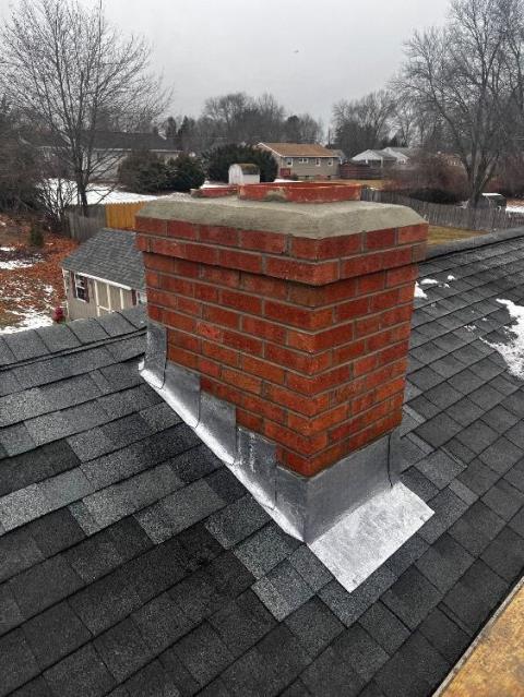 Chimney rebuild with new flashing 