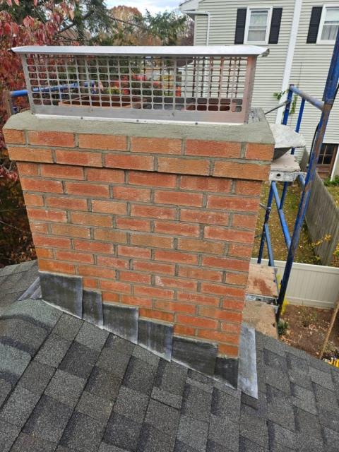 Rebuilt chimney to proper height with new flashing and new custom stainless steel cap in vernon ct 