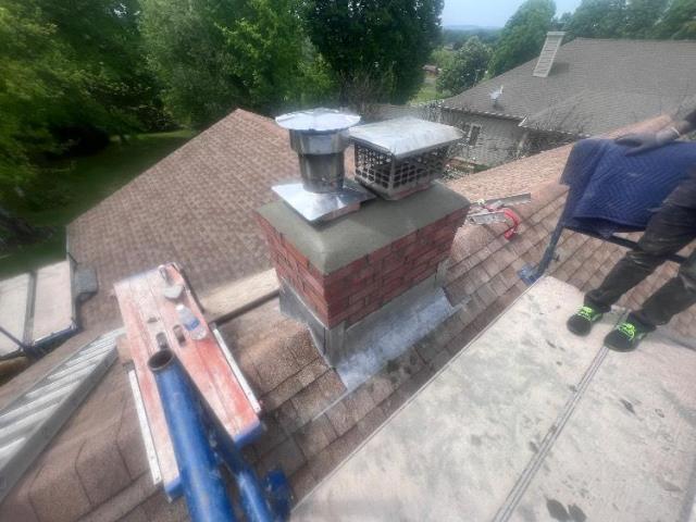 This is A Full Roof Up Rebuild With Flashing , Flue Tiles, Crown and Cap.