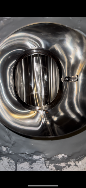 Evidence was found of cracked and spaced out flue tiles, allowing byproducts of combustion to escape the flue prematurely, leading to a poorer draft, and thus more condensation and byproducts of combustion settling on the flue tiles, then mixing to create sulphuric acid and thus more deteorioration. Safeside Chimney installed a stainless steel double-wall liner.