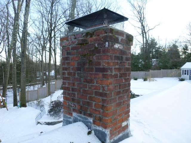 This chimney had loose bricks and missing mortar. SafeSide Chimney performed a roof-up rebuild for West Hartford homeowner, including flashing, crown, and multi-flue cap.