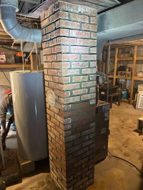 Per customers request , we patched a hole at base of chimney in Manchester, CT.