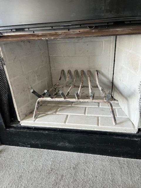 Our Greenwich CT customer had a prefabricated fireplace inside a wooden chase.   The fireplace had cracked Refractory Panels. Once they become cracked or broken, heat can bypass beyond the panels and overheat portions of the Metal Fireplace. We replaced all four refractory panels with new panels.