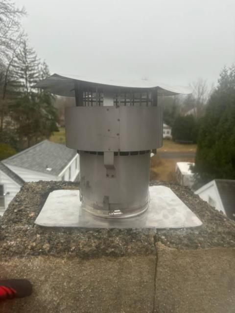 Level I Chimney Inspection performed on a Darien Ct flue system revealed severe deterioration of tiles, and areas completely devoid of tile and masonry. Installed a UL listed chimney liner kit.