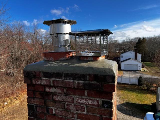 In Colchester, CT, we found the chimney crown to be cracked and lifted, allowing water entry into the rest of the chimney structure. Safeside Chimney installed a new crown for this client. In Colchester, CT, we found the chimney crown to be cracked and lifted, allowing water entry into the rest of the chimney structure. Safeside Chimney installed a new crown for this client.