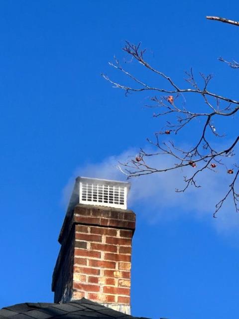Installation of multi-flue rain cap to cover all three flues to keep them protected from rainwater, critters, as well as acting as a spark arrestor to stop any embers from coming in contact with the home.