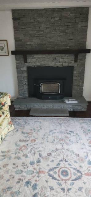 Customer desired a secondary source of heat for large room, Installed a Regency woodstove insert in Guilford CT home.