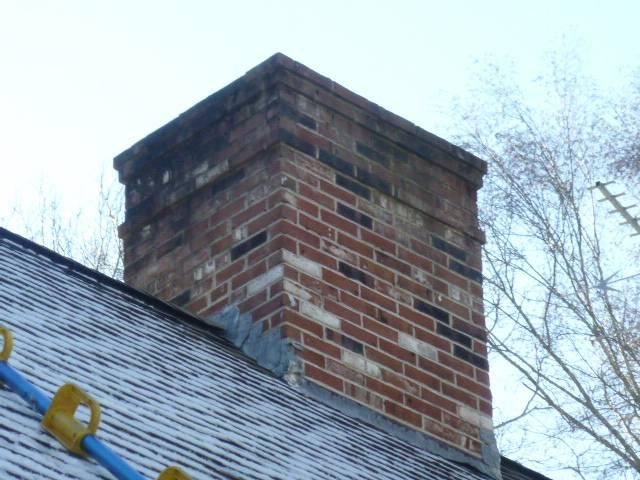 This chimney in Old Lyme CT was leaking into the attic around the chimney. The flashing was found to be in need of repair. Installed all new lead flashing to prevent leaks and extend the longevity of the chimney and house.
