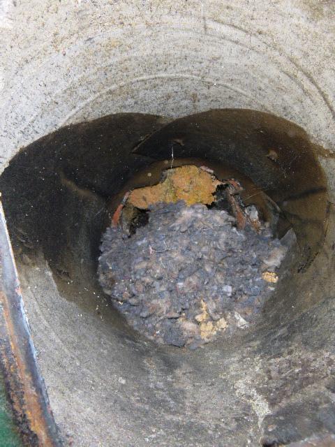 Clogged chimney pipe Enfield ct,  with aging connector pipe upgraded with new chimney liner system with appropriate cleanout to provide safe passage of flue gasses. 