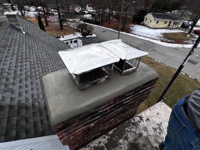 Partial rebuild of crown, top terracotta clay tiles, and reinstallation of Oakdale Ct homeowners rain caps.