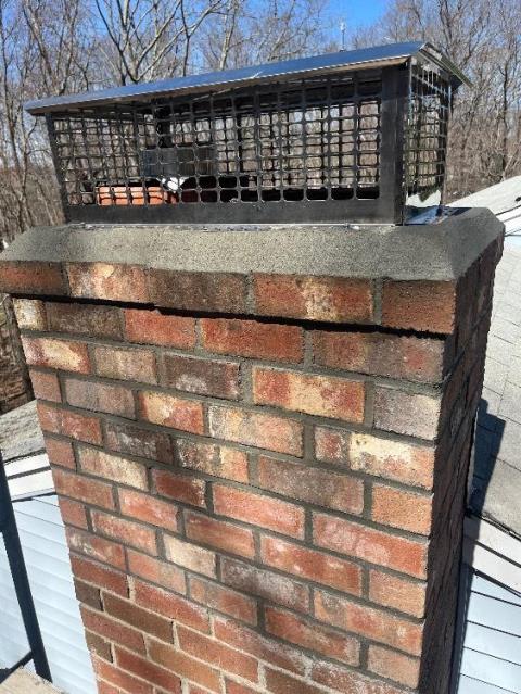 This chimney was split all the way through in Tolland CT. Needed to Demo and Remove top two feet of brick and cement. Rebuilt top portion of chimney , Installed appropriate sized stainless steel cap. Replaced flashing where chimney meets roofline.