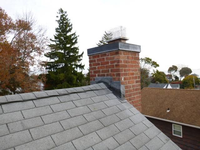 West Haven Ct Chimney cap was missing lid , allowing water into fireplace , and the furnace liner was uncapped altogether. Replaced with a stainless steel multi-flue chim-cap.