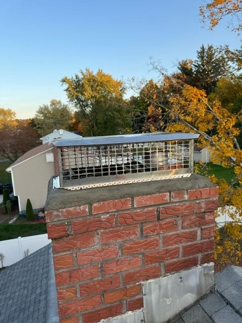 In Windsor, CT, existing crown had a spot repair in its past, that was no longer viable to protect the chimney from water entry. We installed a new crown to prevent water entry and to increase the longevity of the chimney. Reinstalled the homeowner's cap.