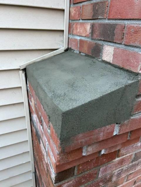 This client in Stafford, CT had a chimney with spalling on a many bricks above the shoulder. Safeside Chimney rebuilt the chimney from the shoulder up including the shoulder.