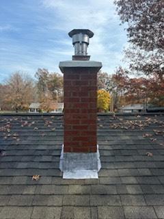 Suffield CT chimney liner to vent the gas heating system installation and roof up rebuild.