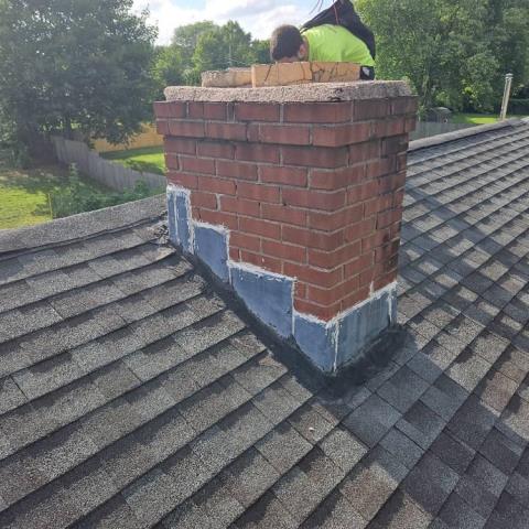 Enfield Ct chimney had cracked and broken liner tiles at top , the flashing and roof had a homeowner style spot repair done in past that wasn’t effective.  Rebuilt chimney roof up  with new flashing , masonry , flue tiles and cap.
