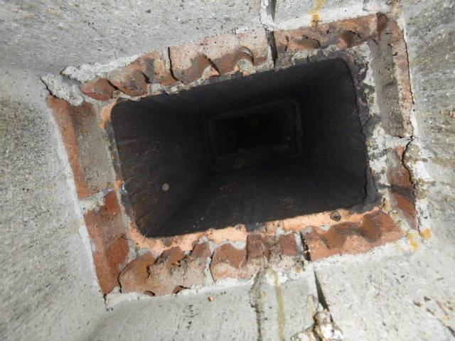 This Shelton CT high-efficiency boiler’s exhaust system was causing corrosion in the chimney, Installed a stainless steel liner properly sized to safely vent the unit.