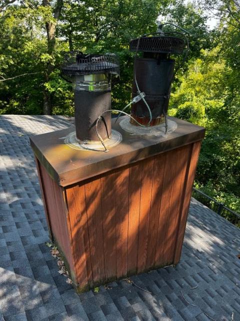 Prefabricated chimney system in Litchfield ct had rusted and deteriorated chimney pipes , chase cover , and caps. Replaced all with with rustproof stainless steel