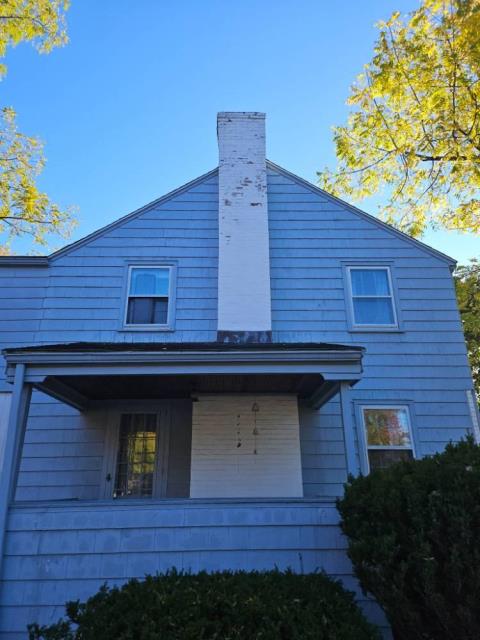 East Hartford ct painted chimney has deteriorated at a more rapid rate due to paint sealing the pores of the brick preventing moisture from escaping naturally. Need to dismantle chimney exterior halfway, rebuild chimney exterior with new specialty brick and mortar.