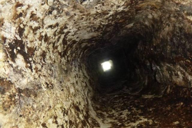 Oil flue was missing a rain cap and had water deterioration and pitting throughout the chimney tiles – Replaced with a gas tight venting system.