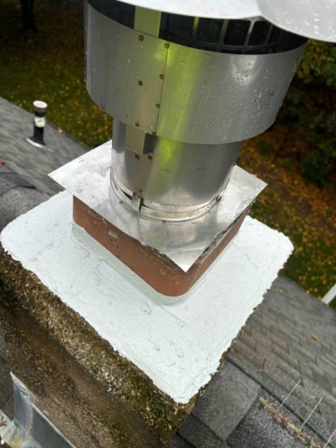 Oil flue was missing a rain cap and had water deterioration and pitting throughout the chimney tiles – Replaced with a gas tight venting system.