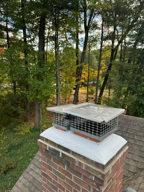 Windsor Ct cracked crown repaired with waterproof crowncoat and installed two stainless steel chimney caps.