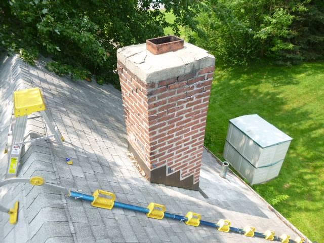 Rebuilding in progress , to resolve water damaged chimney in Wallingford Ct with new lead flashing.