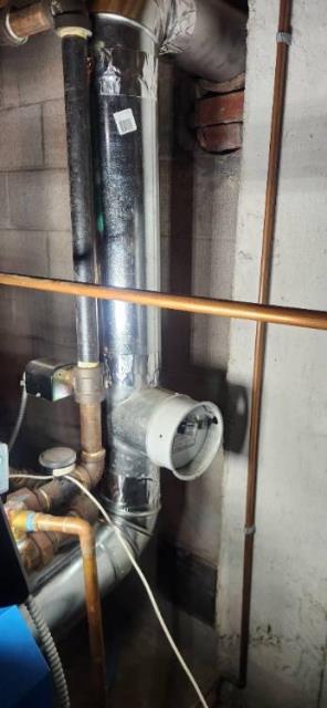 In Guilford, CT, we found condensation damage to the interior of the flue. Need to install a properly sized, stainless steel 2-ply liner.
