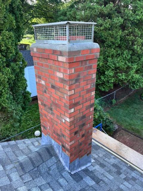 We found spalled chimney brick and a missing cap during a chimney inspection at a Berlin, CT home. We performed a roof up rebuild, including drip edge, new flashing, crown, and caps.