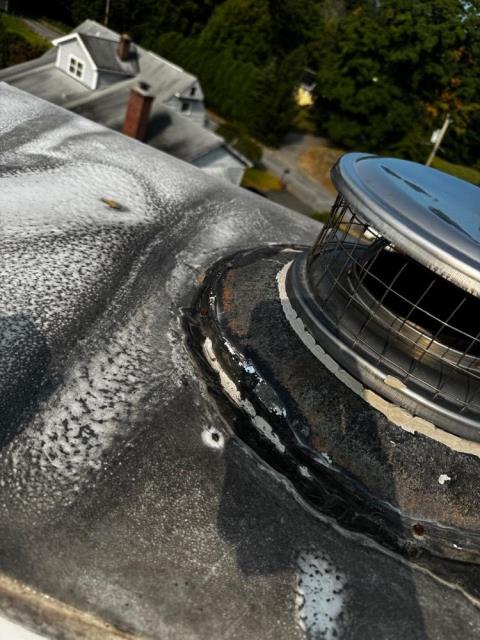 This chase pan in Greenwich CT was rusted and shoddily repaired, allowing leaks and further damage to the chimney. Installed a new stainless steel chase pan and caps.
