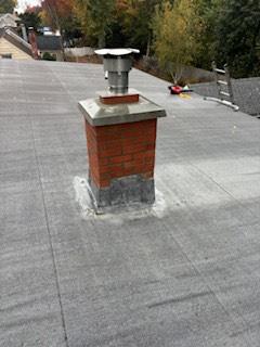 In Glastonbury, CT, did a Roof up chimney rebuild with new flashing, crown, and cap.