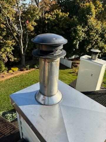 Rusty Portland Ct chase pan replaced – the original galvanized metal flat pan allowed water to pool, cause rust, and come in around chimney pipe – New stainless steel chase cover installed with proper angled breaks to allow water to run off, rather than pool, as well as a storm collar to keep damaging water from entering the chimney chase and home.