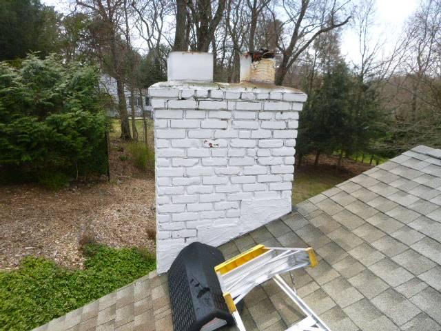 In Westport CT, The Entire Top Of The Chimney Had Sulfuric Acid and Structural Damages Developing Down to the Roofline. Once The Sulfuric Acid was Contained, the Chimney Structure Needed To Be Taken Down To the Roofline And Rebuilt With All New Brick and Cement, We also Installed Flashing, Replaced All Top Fireplace Flue Tiles / Venting System, Built Chimney Back To Existing Height and Footprint, Reconstructed New Cement Crown With Proper 2 Course Drip Edge And Reinstalled the Homeowner's Stainless Steel Caps.