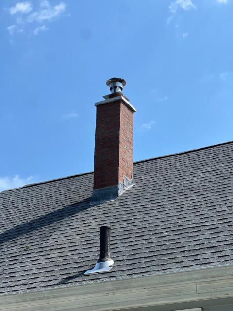 New London CT chimney rebuild with new brick and masonry, along with lead flashing. New London CT chimney rebuild with new brick and masonry, along with lead flashing.