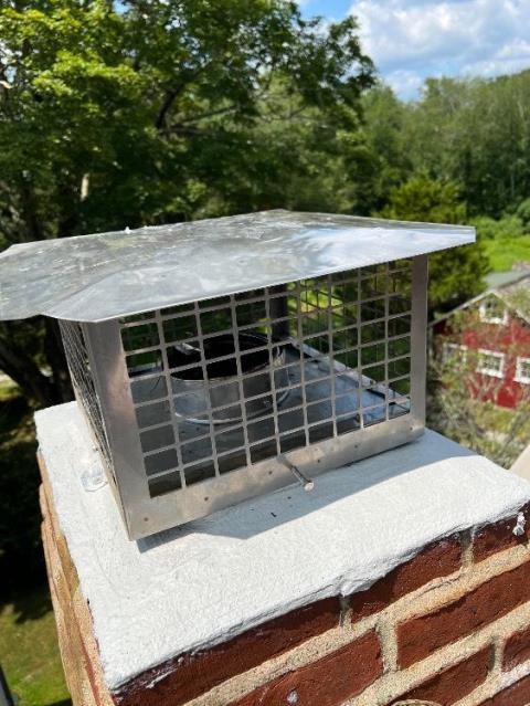 Westport ct flue tiles had areas of missing mortar and cracks and was a little oversized for the unit , installed a gas tight properly sized stainless steel liner system.  Reinstalled customers cap.
