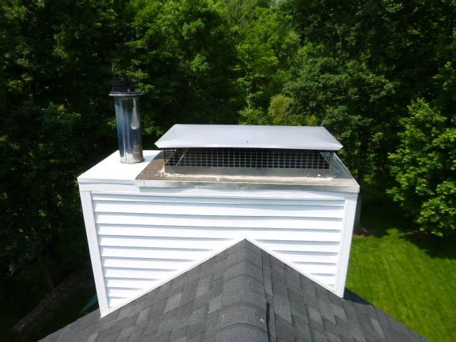 Stamford ct chase pan needed.  A home owner style repair was done with the wrong product , leaving the air cooled chimney open to excessive outside air , heat , smoke and embers.  Installed proper pan , chimney pipe and storm collars and caps.