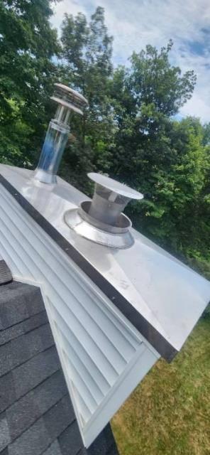Stamford ct chase pan needed.  A home owner style repair was done with the wrong product , leaving the air cooled chimney open to excessive outside air , heat , smoke and embers.  Installed proper pan , chimney pipe and storm collars and caps.