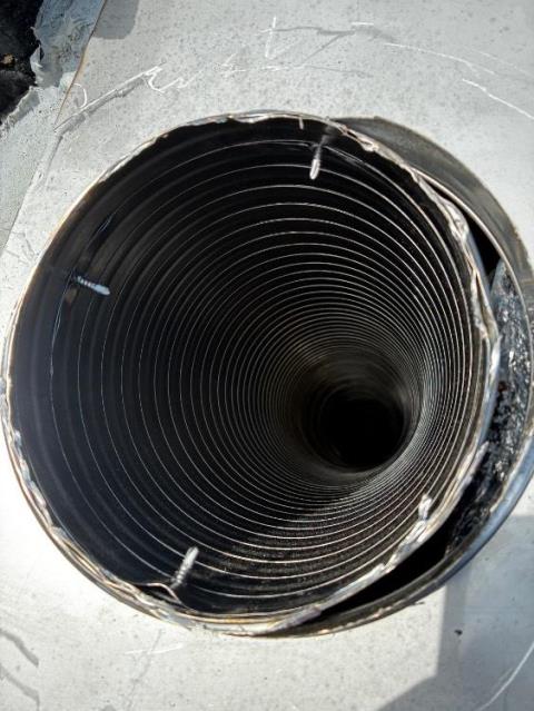 In Burlington, CT, Level 1 Inspection Found A Damaged Oil Boiler Chimney Flue tile offset with missing mortar. Installed a properly sized 2-ply stainless steel chimney liner.