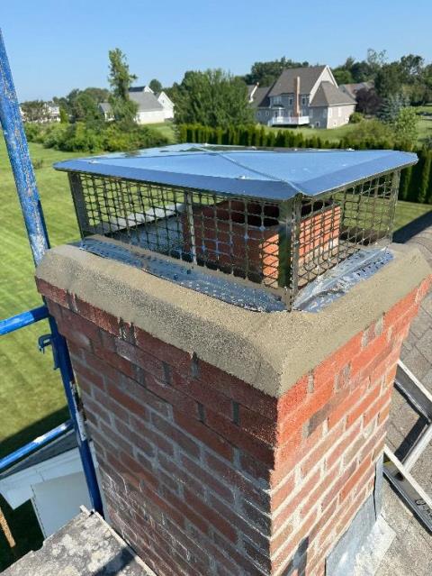 Upon arrival in Suffield CT we found the top section of the chimney severely saturated with structural damage extending down to the roofline. Loose bricks, open joints, and failing flashing indicated advanced deterioration needing full upper rebuild.