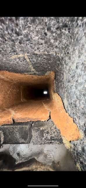 Chimney severely damaged inside and out , installed a gas tight stainless steel liner system. We also rebuilt the chimney exterior to the roofline with new brick, crown, and flashing for long-term protection and performance.