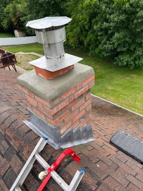 Chimney severely damaged inside and out , installed a gas tight stainless steel liner system. We also rebuilt the chimney exterior to the roofline with new brick, crown, and flashing for long-term protection and performance.