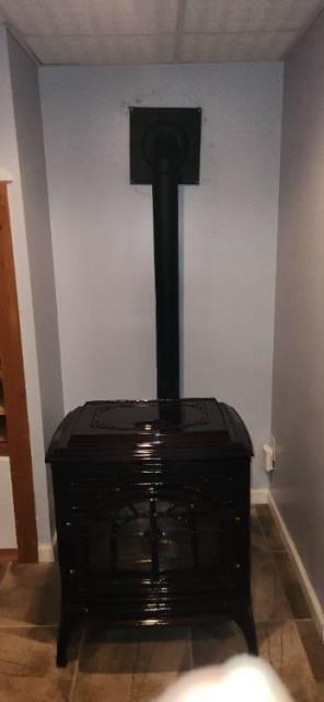 Installed a properly sized liner system to vent a Pellet stove in Middletown ct , and replaced the crooked galvanized piping with proper stove pipe.