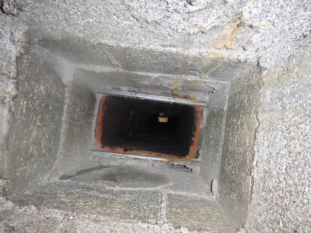 In Cromwell, CT, We found the rear chimney flue tiles cracked from acidic condensation caused by the high-efficiency burner. A stainless steel liner was needed.
