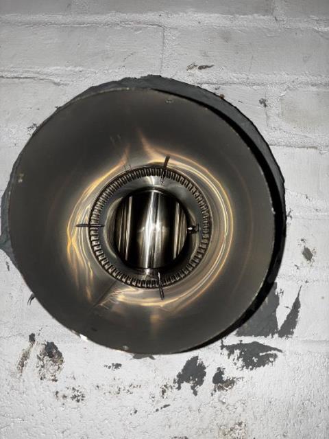 In Cromwell, CT, We found the rear chimney flue tiles cracked from acidic condensation caused by the high-efficiency burner. A stainless steel liner was needed.
